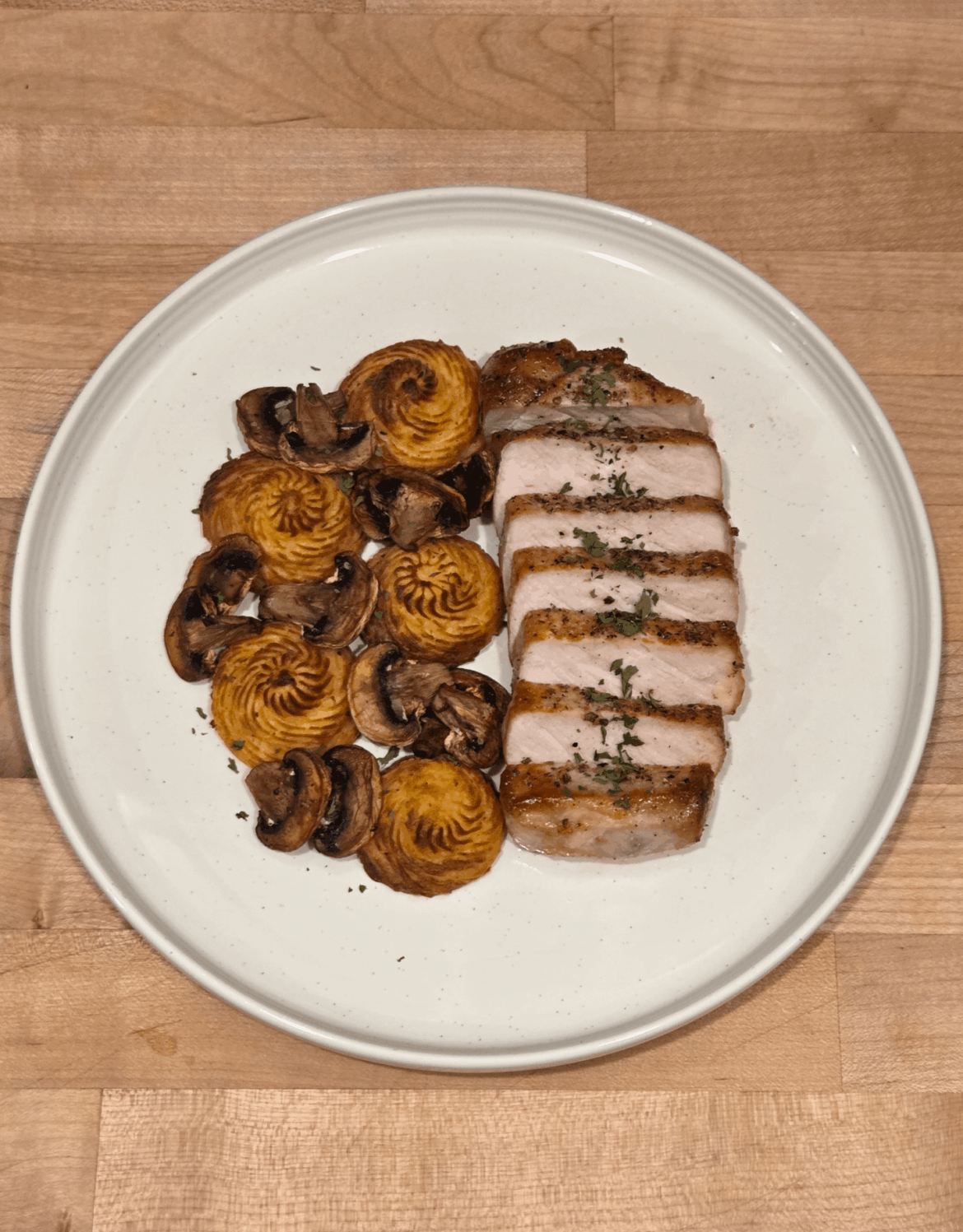 Pork Chop, Dutchess Potatoes, Roasted Mushrooms