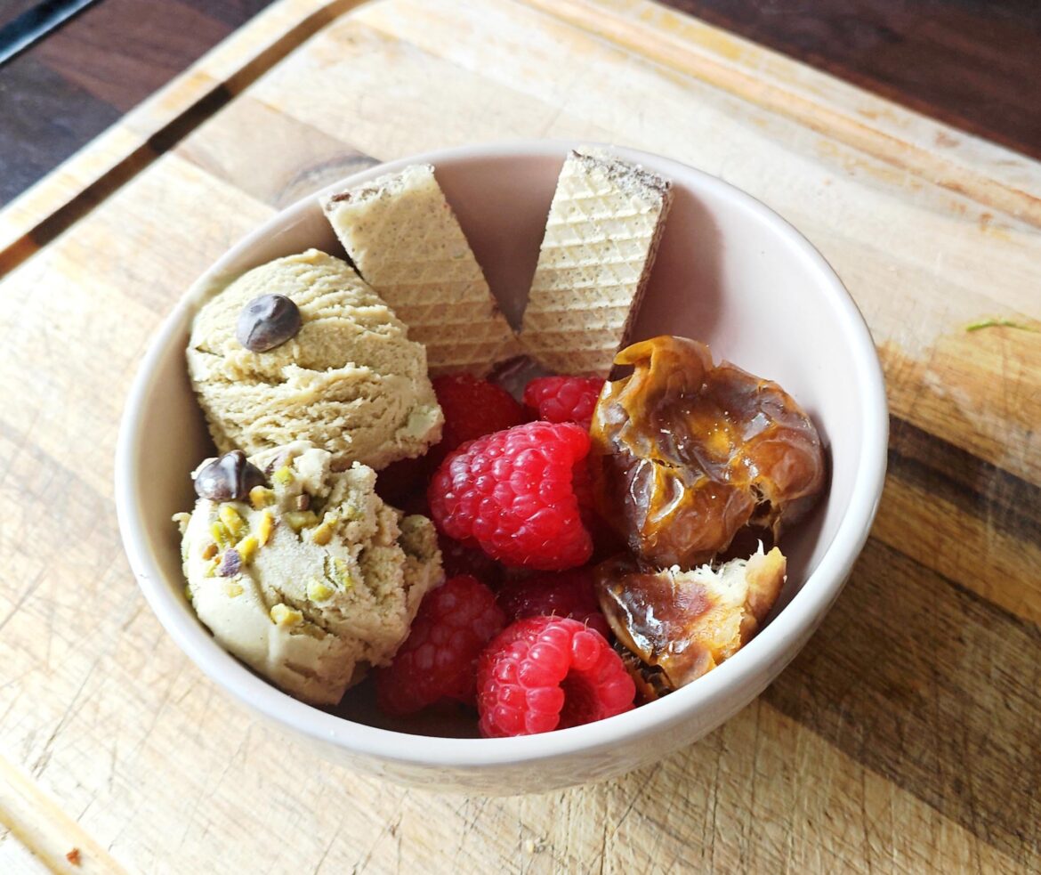 Raspberries, fresh dates, chocolate wafer and pistachio gelato with a couple of chocolates chips