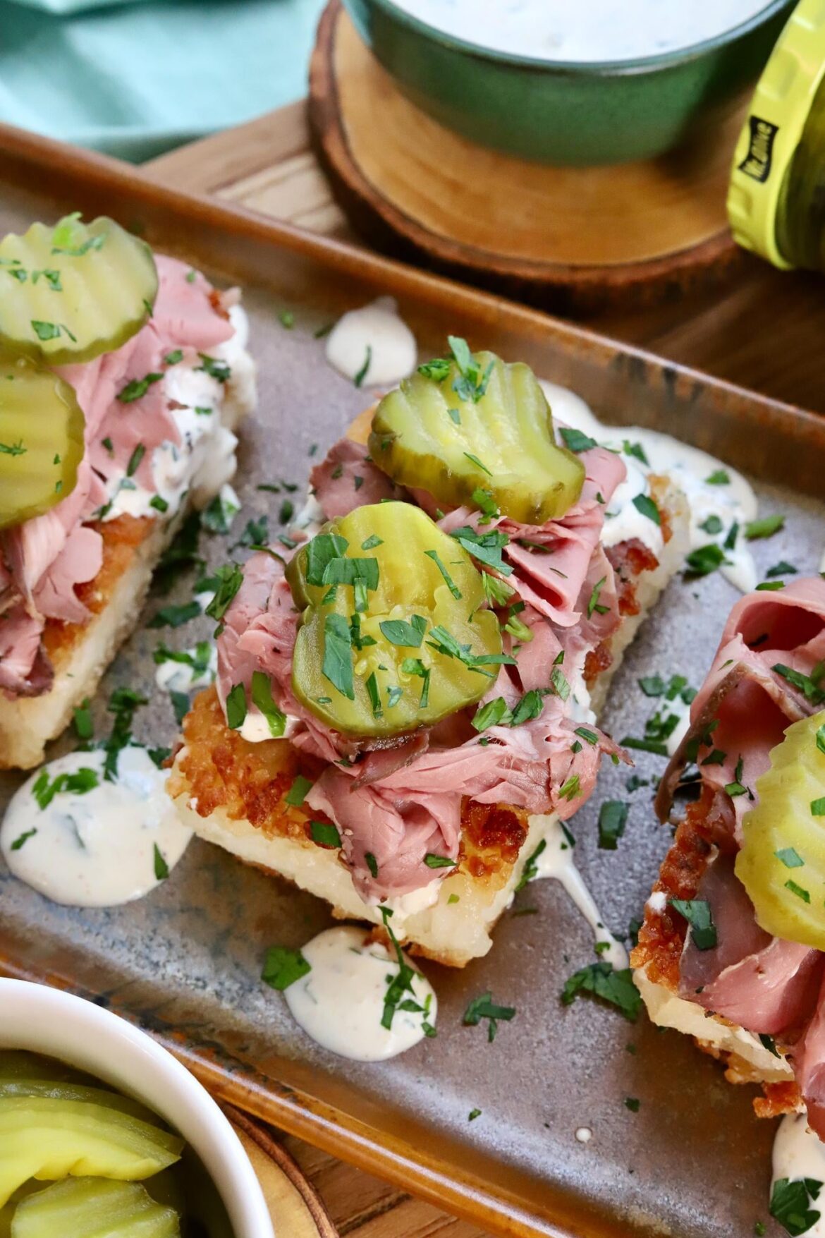 Roast Beef Sandwich "Sushi" Bites on Crispy Rice Cakes drizzled with Horseradish Cream Sauce