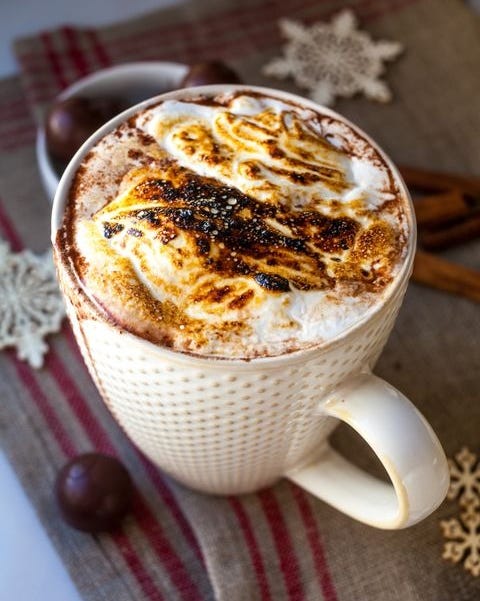 salted dark chocolate truffle and toasted marshmallow hot chocolate in white mug