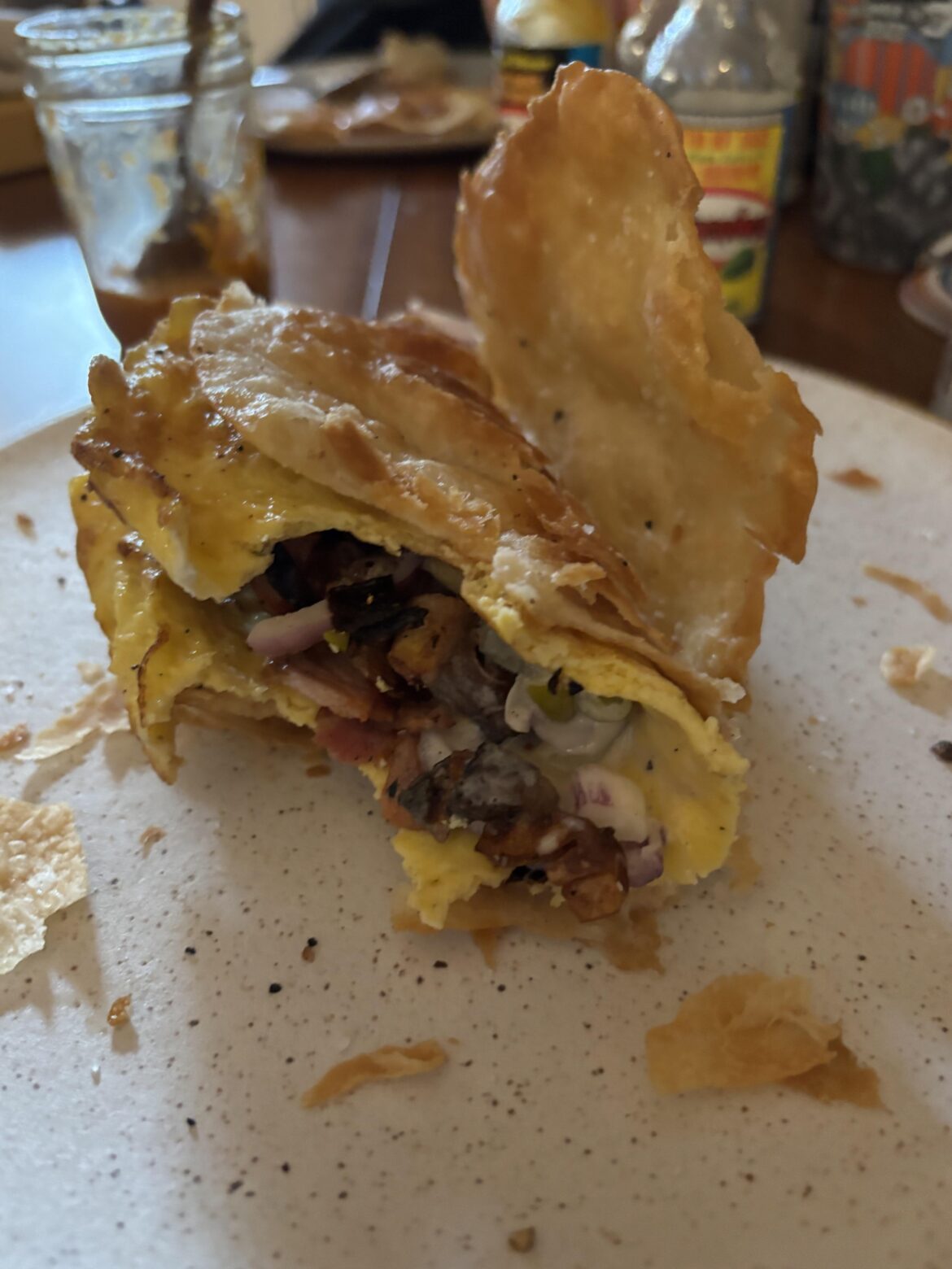 Fried flour tortilla with egg, thinly sliced chorizo, and a pineapple & pickled jalapeño yogurt chutney