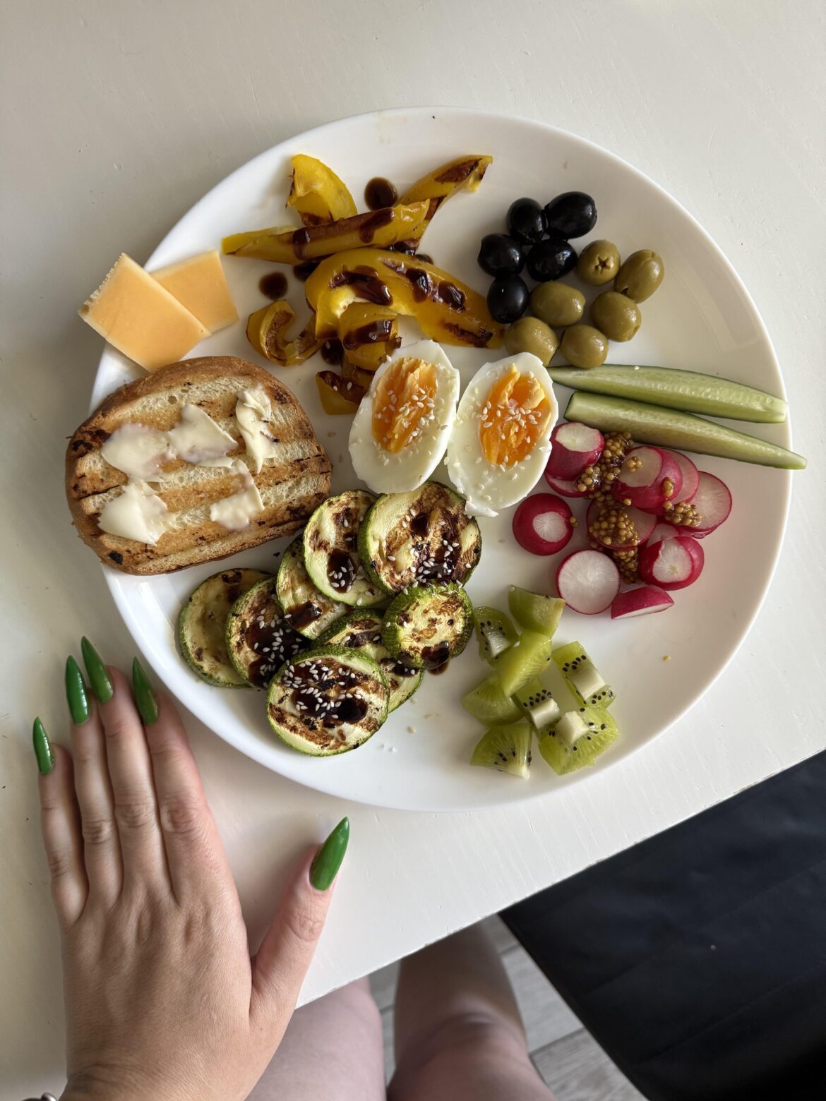 Grilled veggies, some cheese, egg with sesame seeds