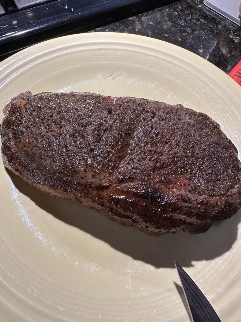 Strip steak 131F 3 hours from frozen, finished with sous vide gun