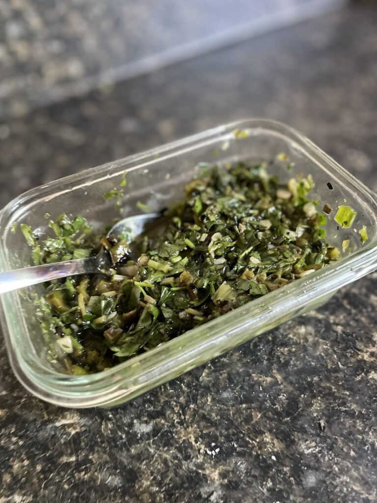 Italian salsa verde overtop NY strip steaks with charred broccolini for dinner tonight