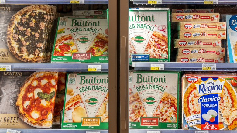 Frozen pizzas in a grocery store freezer