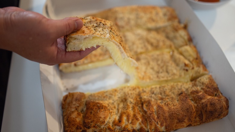 Old Forge pizza in tray