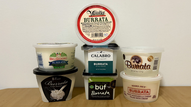 Assorted containers of burrata cheese