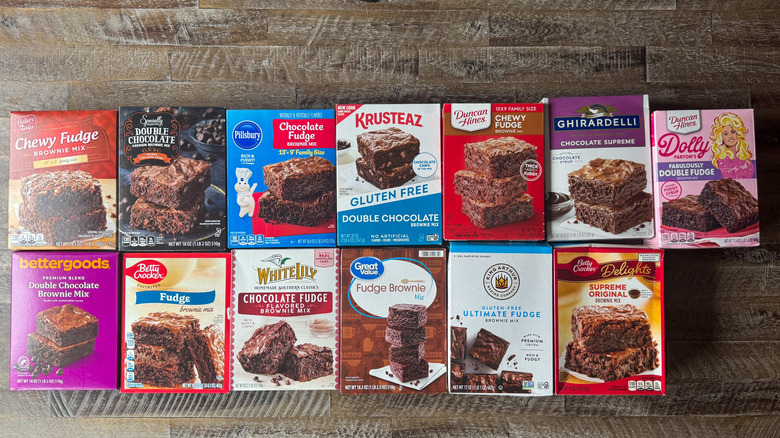 Boxed brownie mixes on wooden surface