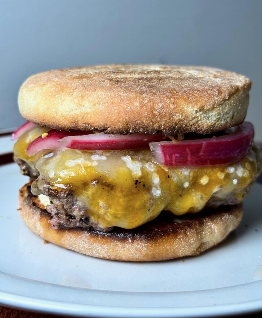 Happy Friday - English muffin, 6oz patty, Colby Jack, pickled red onions.