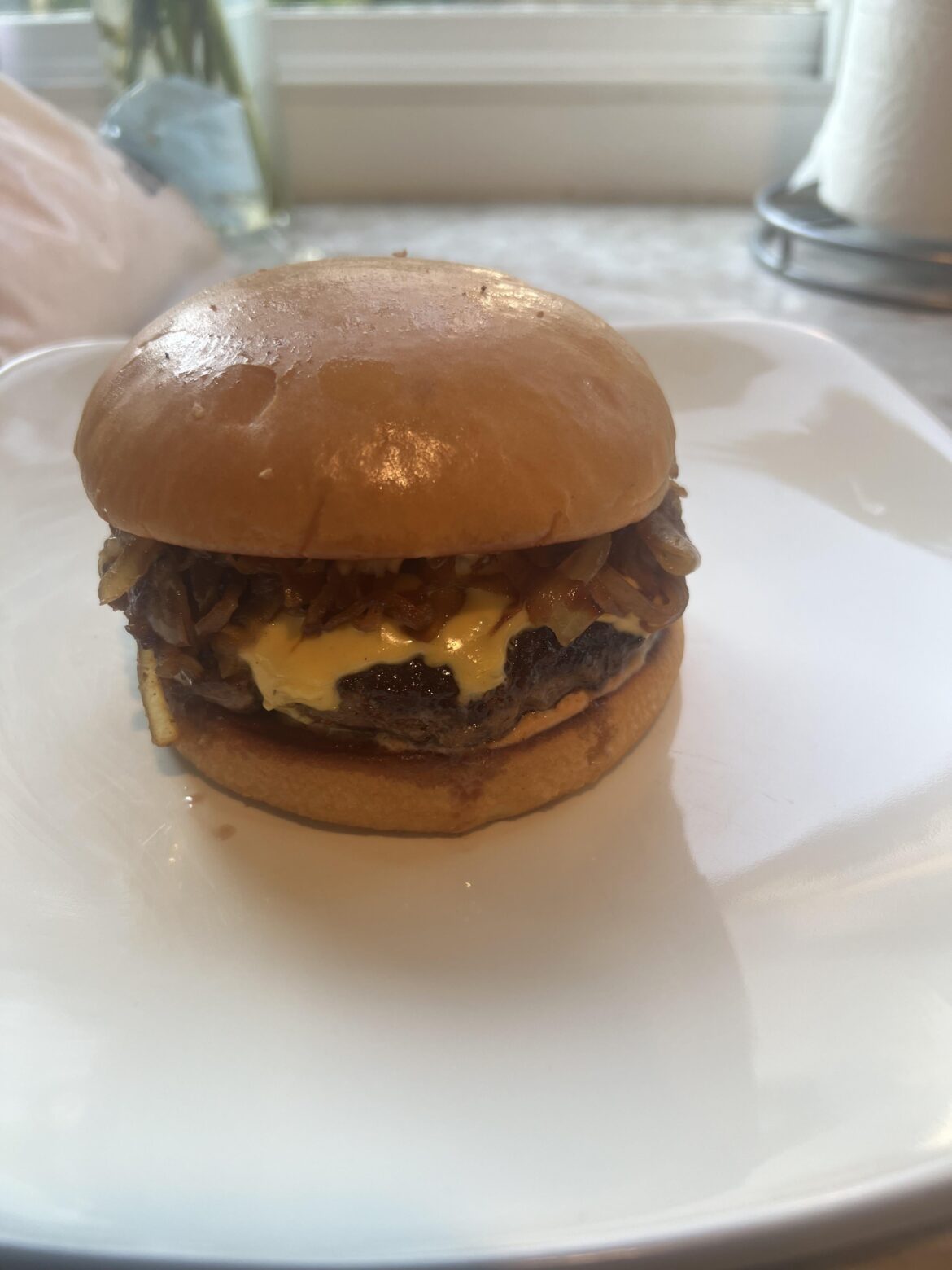 Cheeseburger with onions