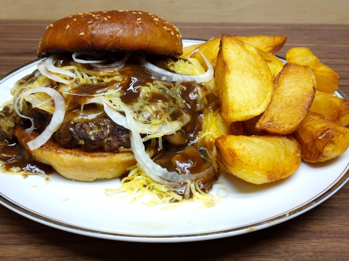 Shaved onions layered with Gouda