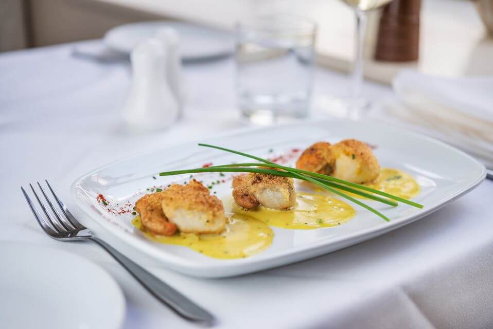 Scallops on a plate at Italian restaurant La Galleria in Birmingham