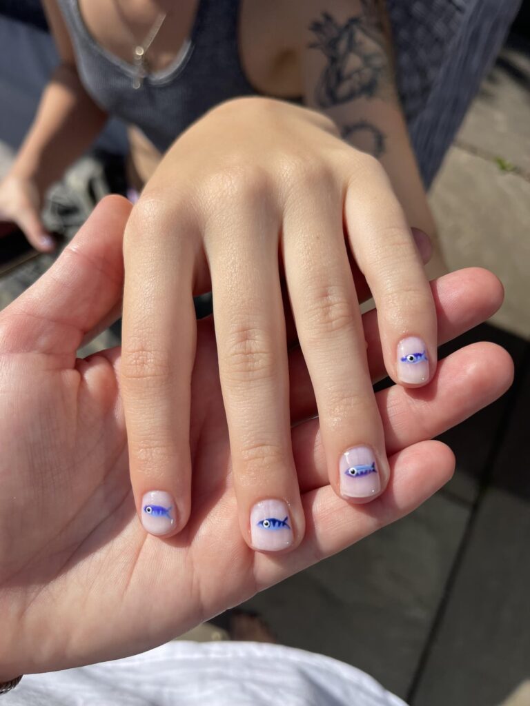 I hand painted sardines on my girlfriends nails