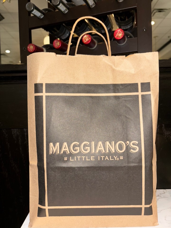Maggiano's Little Italy paper bag.