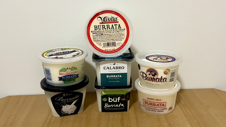 Assorted containers of burrata cheese
