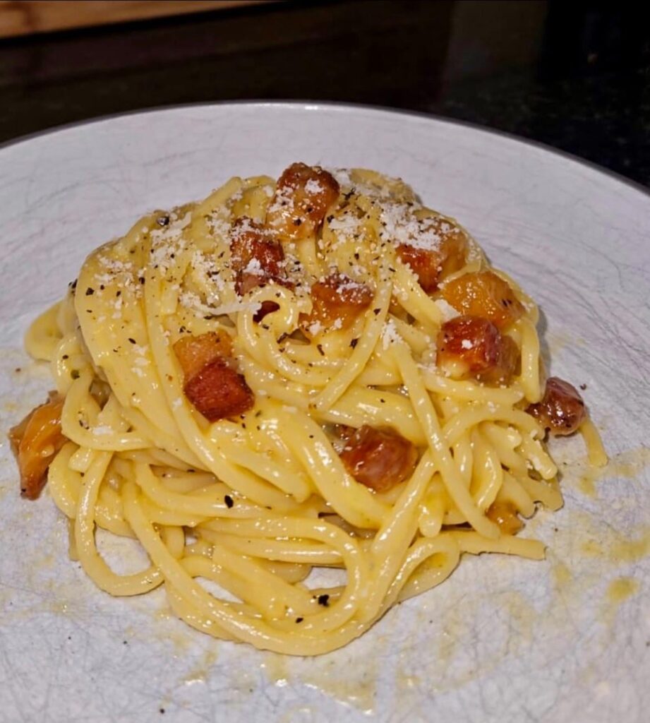 First time making carbonara. Made with guanciale, pecorino romano & egg yolks.