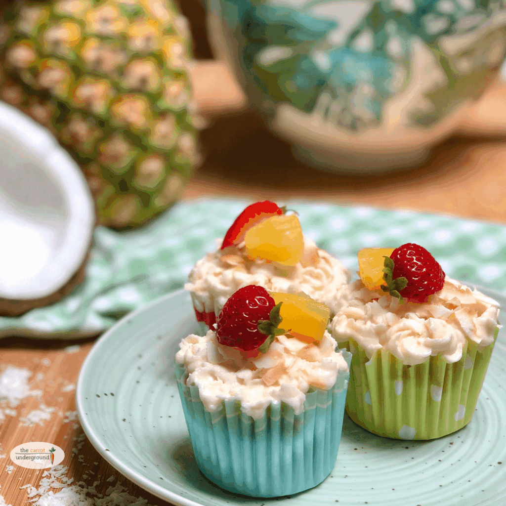 Vegan Piña Colada Cupcakes 🍍 topped with coconut buttercream frosting