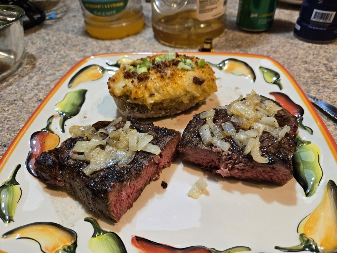Knocked these NY strips out of the park! Damn it feels good to be a grill gangsta! Twice baked tater to boot!