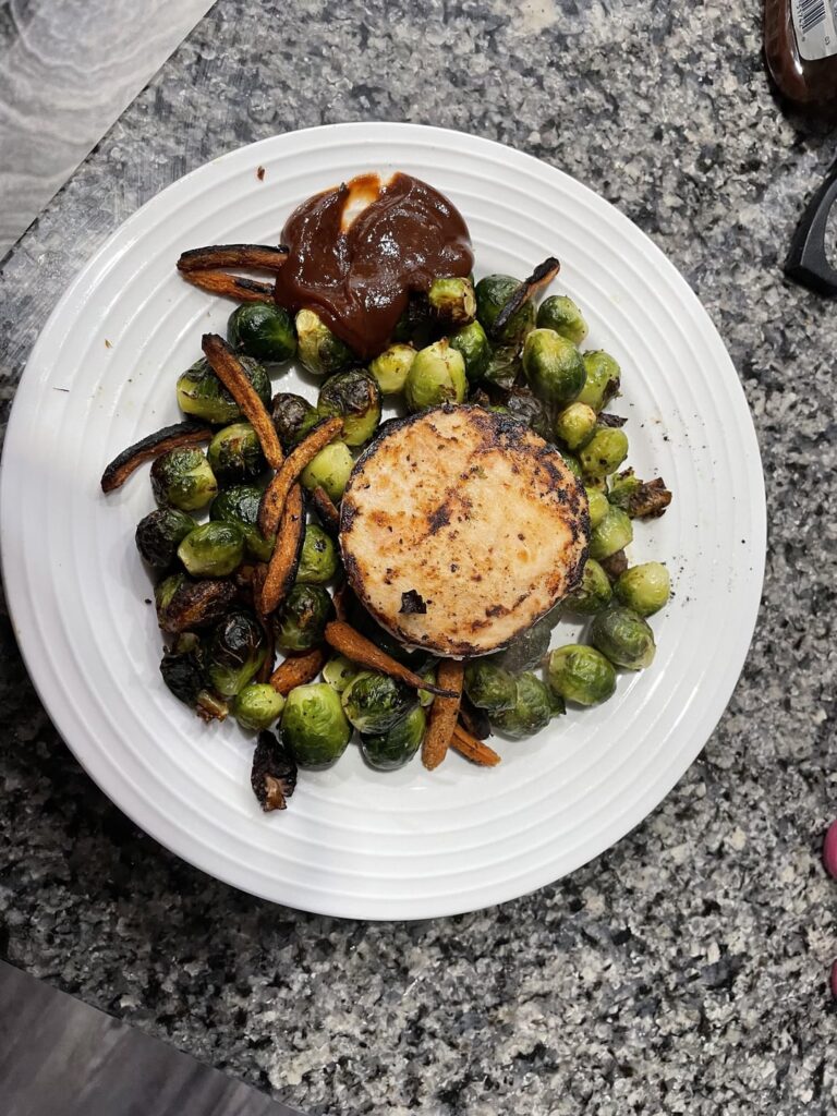 Salmon and brussel sprouts - 27 grams of protein, 240-ish calories!