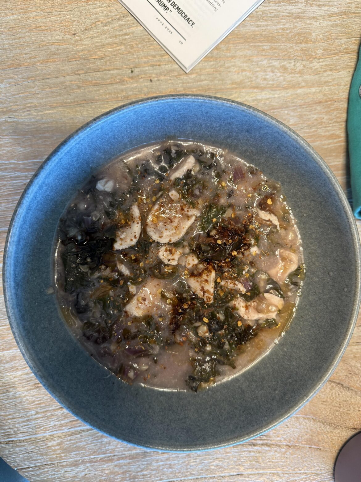 Brown rice congee with chicken, kale, and mushrooms