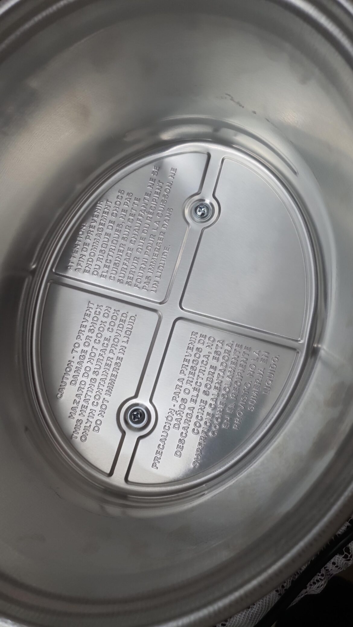 Newly bought crock pot has base dent