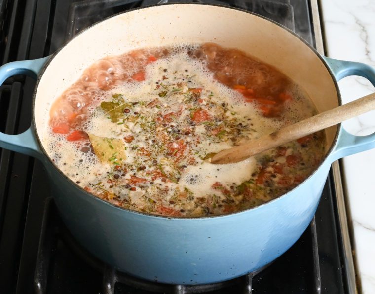 bringing the soup to a boil.