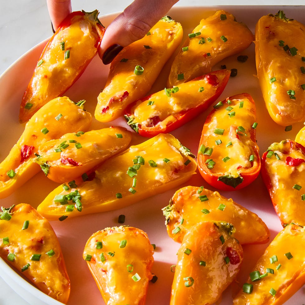 mini red and yellow peppers stuffed with pimento cheese and baked