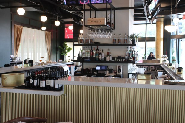 A 24-seat bar is part of Ascione Bistro and Bar's Skokie location at 8000 N. Lincoln Ave. The location is 5,000 square feet, much larger than the original Ascione Bistro in Hyde Park, according to Ascione's owner Alex Argirov. (Richard Requena/Pioneer Press)