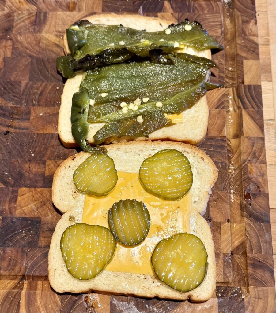 leftover smoked brisket melt with a roasted poblano and sweet hot pickles