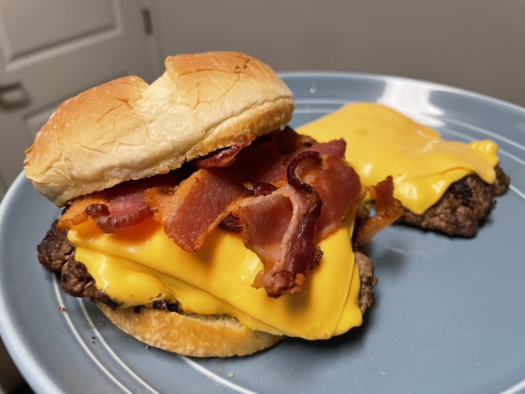 Got a new job with a big pay bump so my girl made celebratory bacon cheeseburgers!