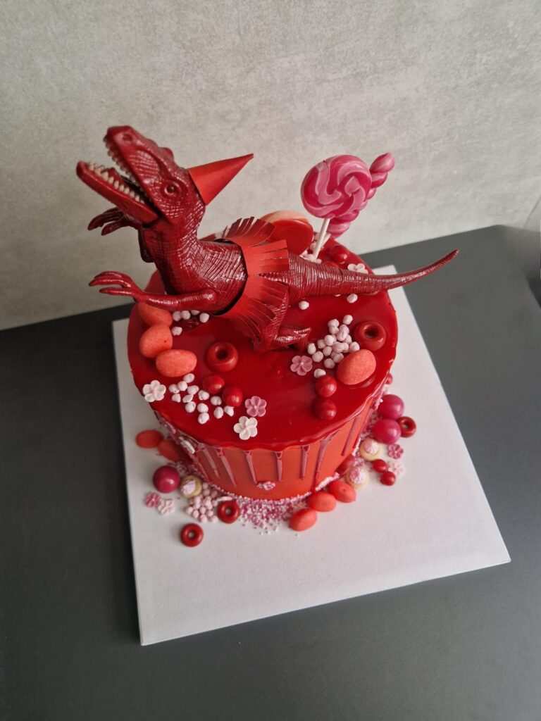 Haven't posted in a while... so here it is my Red Red Dinosauru cake!