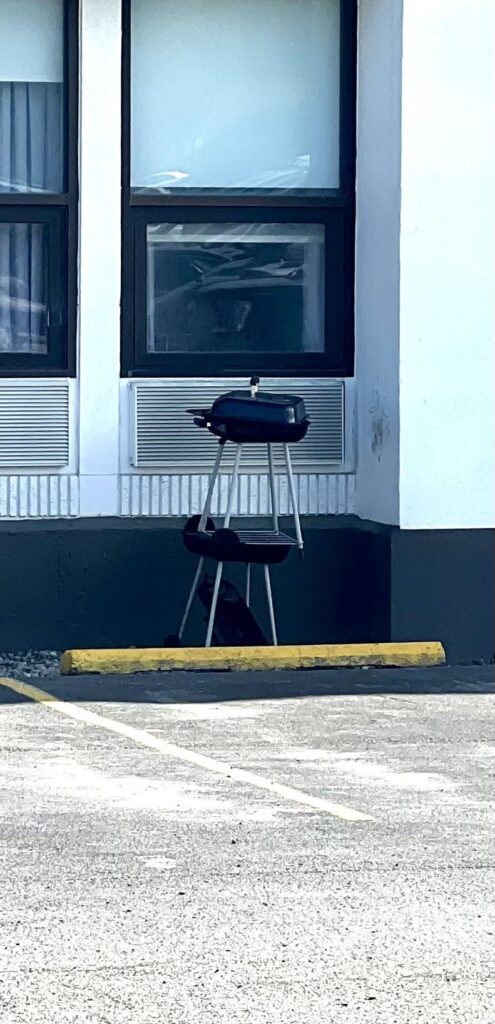 Why grill outside when you can grill from your hotel window?