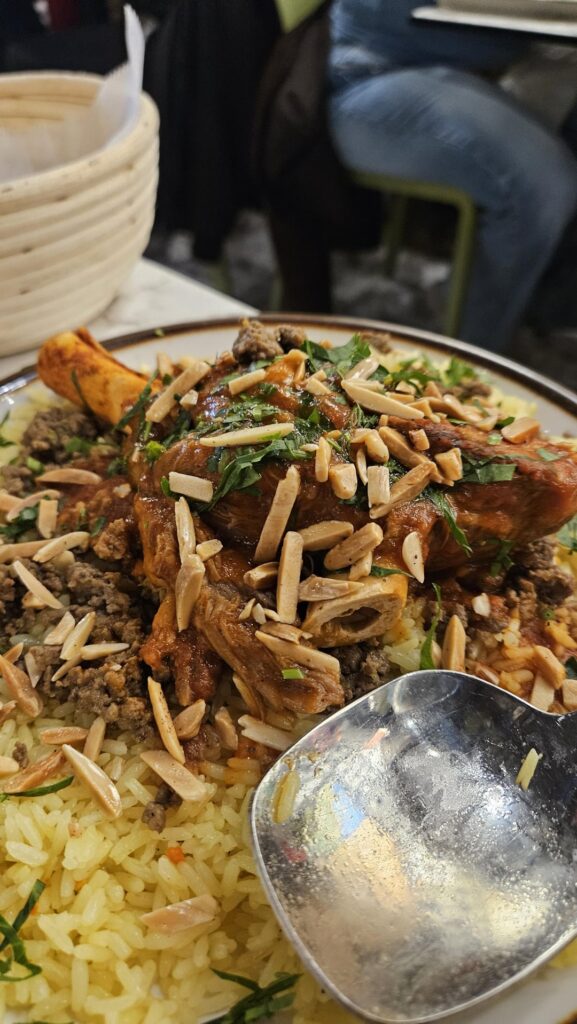 Lamb ouzi, spicy potatoes and fried halloumi from Ayat.