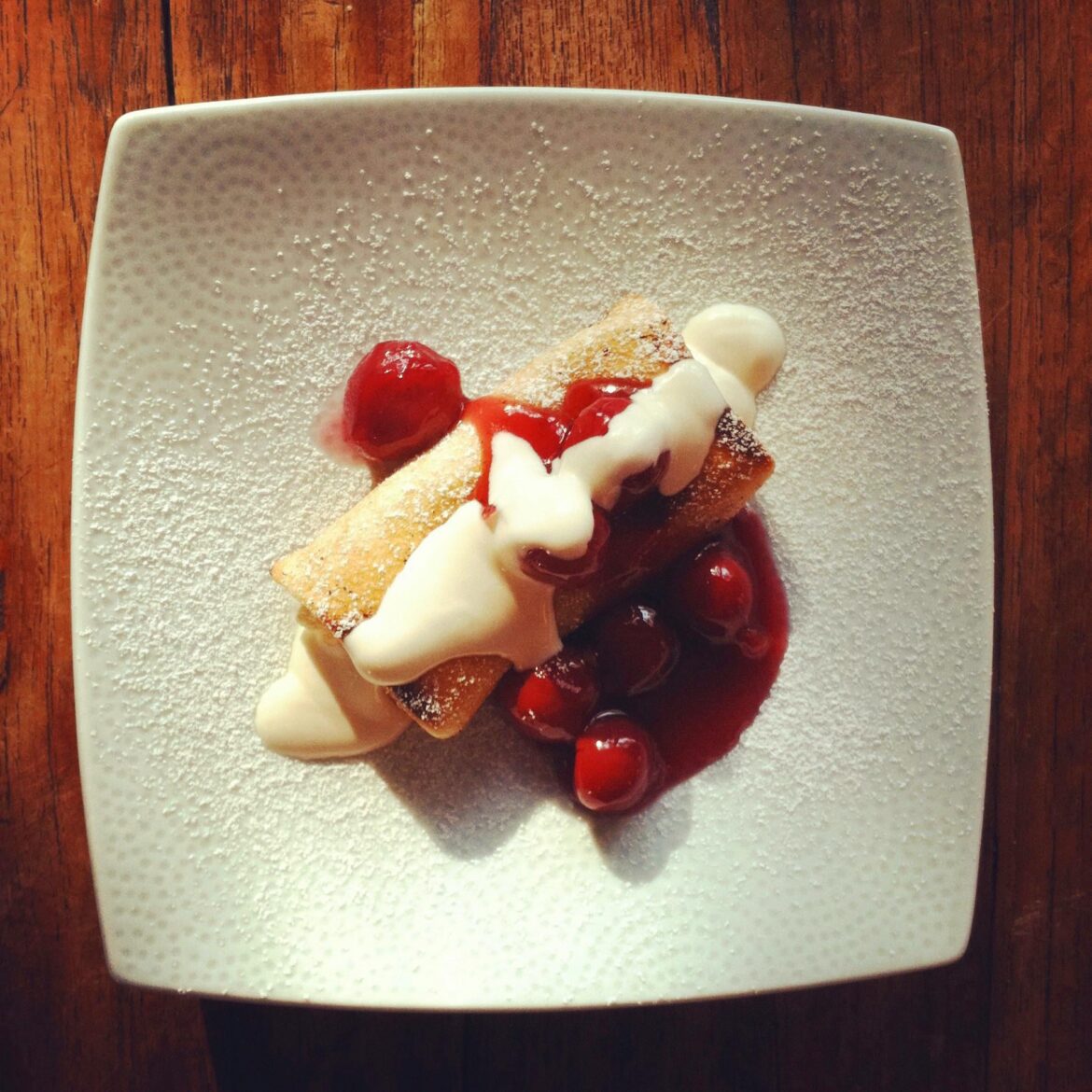 [OC] homemade cheese blintzes with cherry sauce