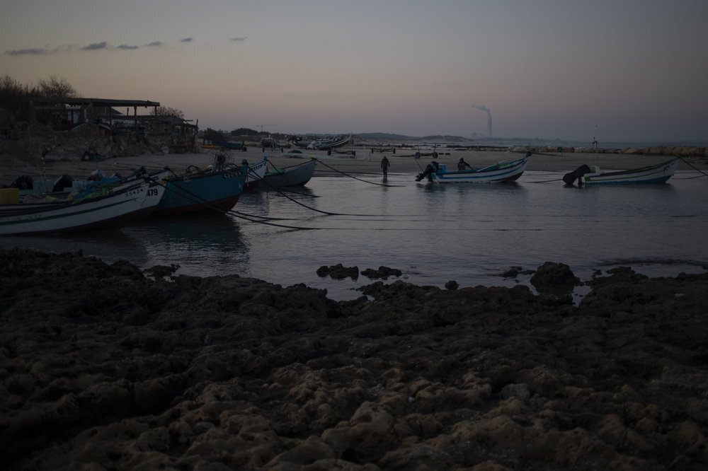 Fishermen unload their nets after returning from a fishing trip on the Mediterranean Sea, in the Arab village of Jisr al-Zarqa (Photo: AP) Fishermen unload their nets after returning from a fishing trip on the Mediterranean Sea, in the Israeli Arab village of Jisr al-Zarqa
