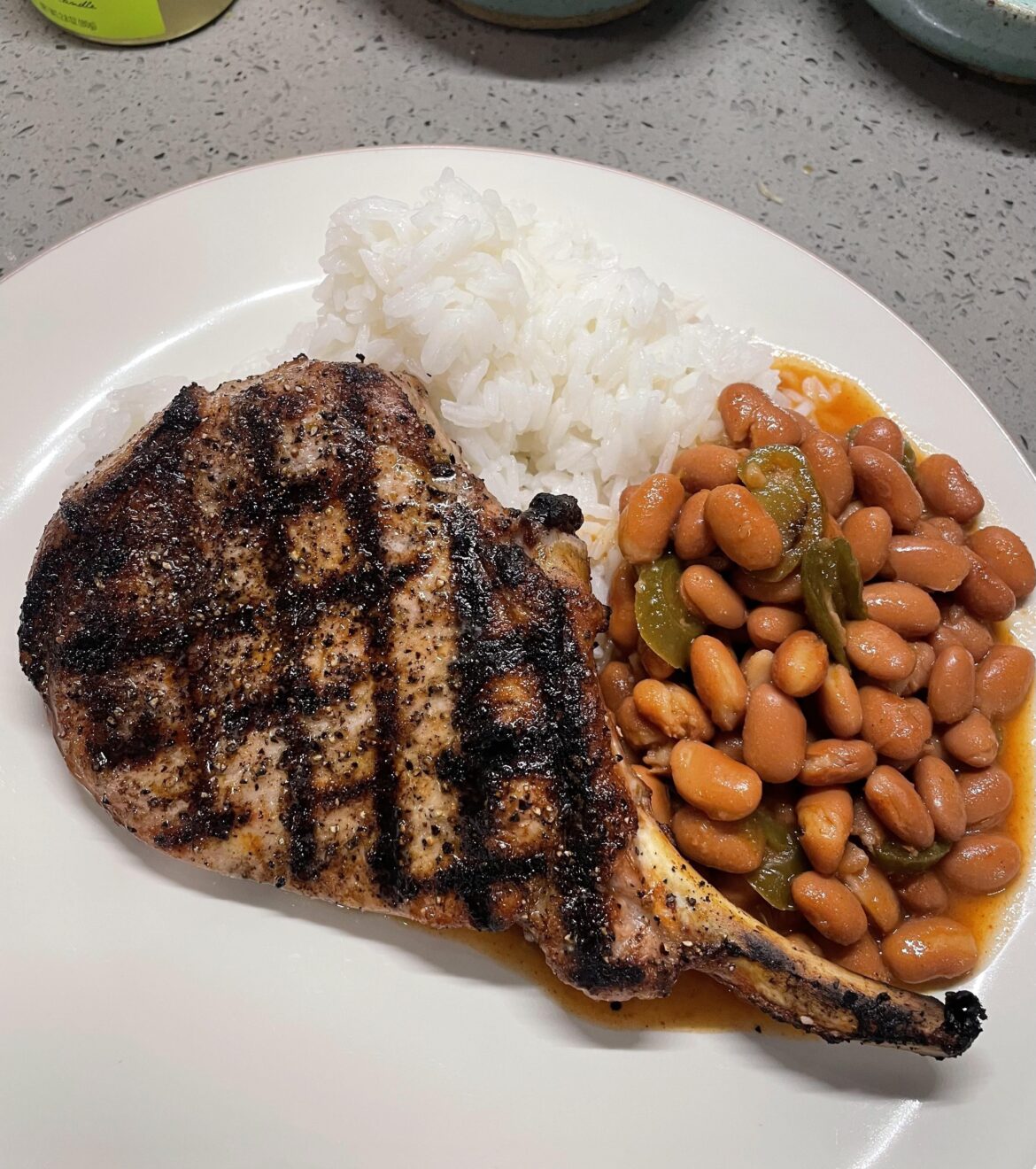 Bone-in porkchop with beans & rice