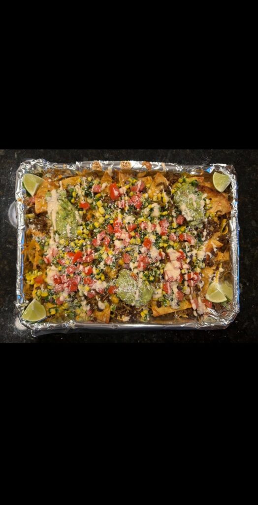 My wife is KILLING it in grad school so I made tortilla chips and turned them into baked nachos last night!
