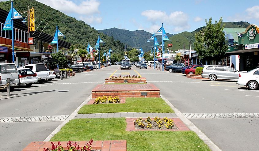 Main street towards distant wooded slopes in Picton, New Zealand. 