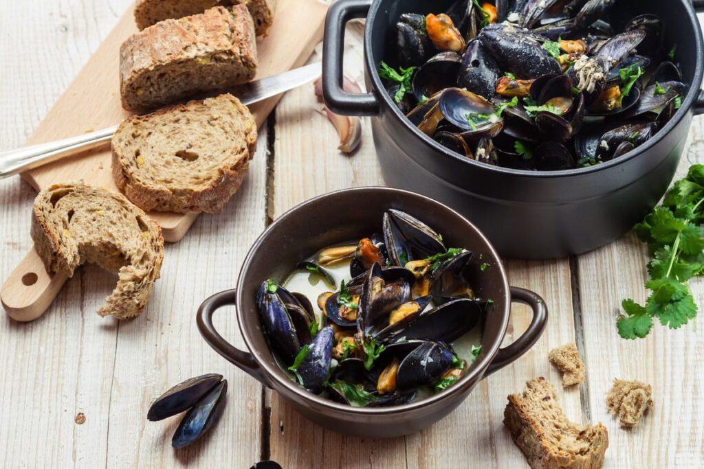 A delicious steaming bowl of moules marinières served at one of the best French restaurants in London