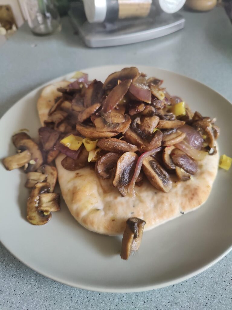 Curried mushrooms on naan