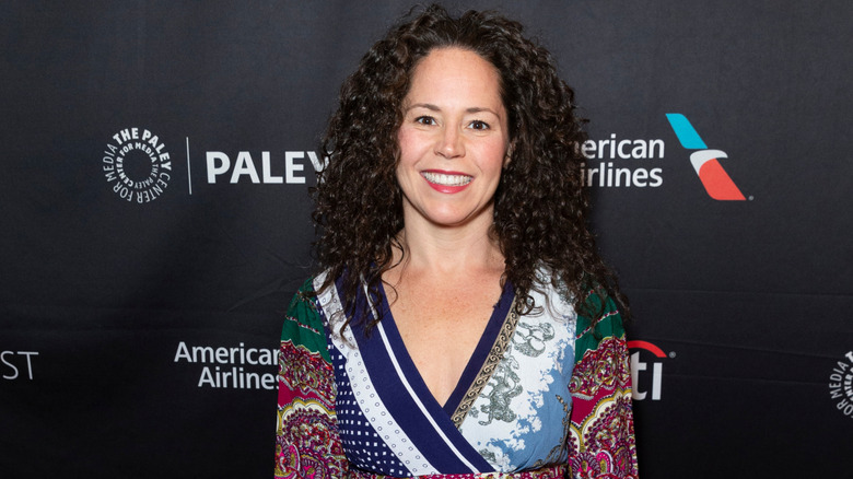 Chef Stephanie Izard smiling at a media event
