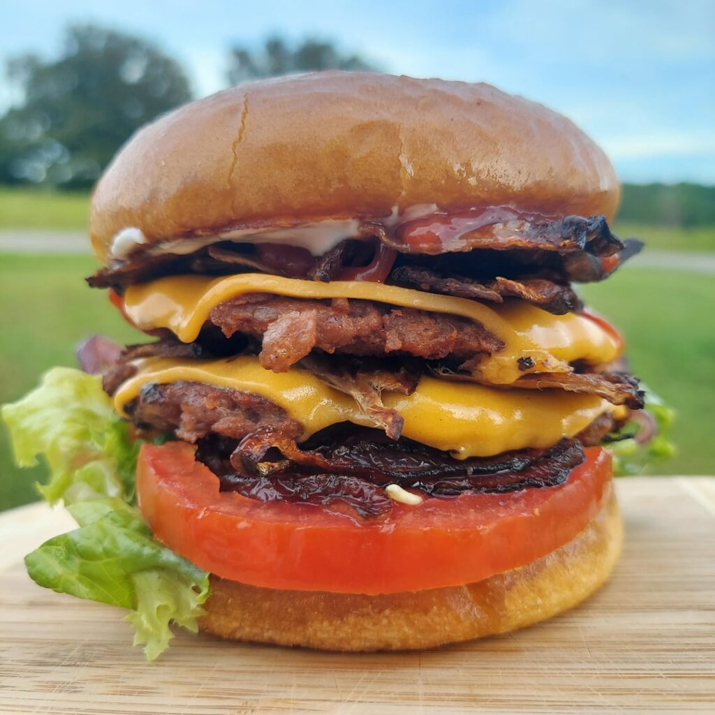 A couple burgers and a horseshoe sandwich