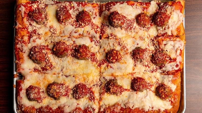 Sicilian pizza in tray