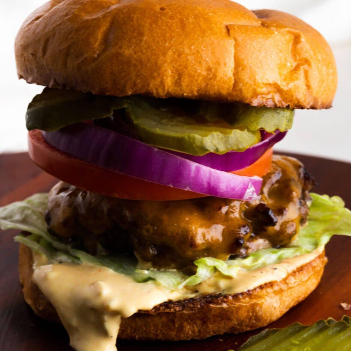 I remember growing up the most frustrating thing when my parents made burgers was how much they would shrink (doesn't help my parents severely overcook everything). I have tried so many strategies to keep my burgers from shrinking and finally nailed down the ones that really work.