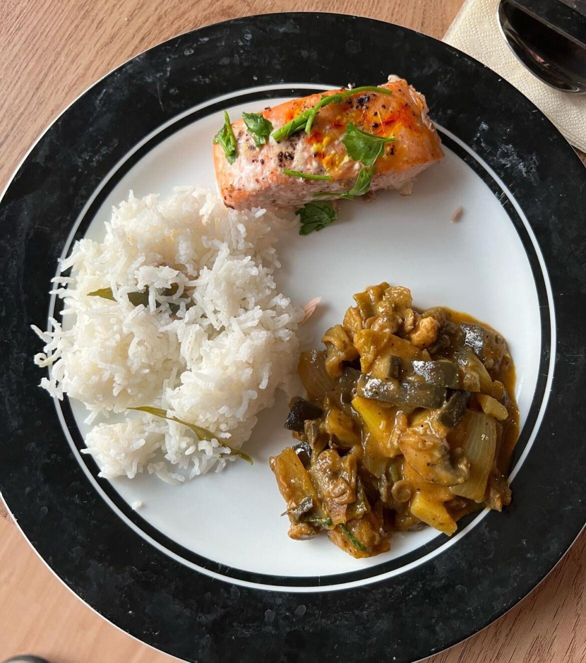 Salmon with sumac and saffron, cashew nut rice and a lentil potato curry