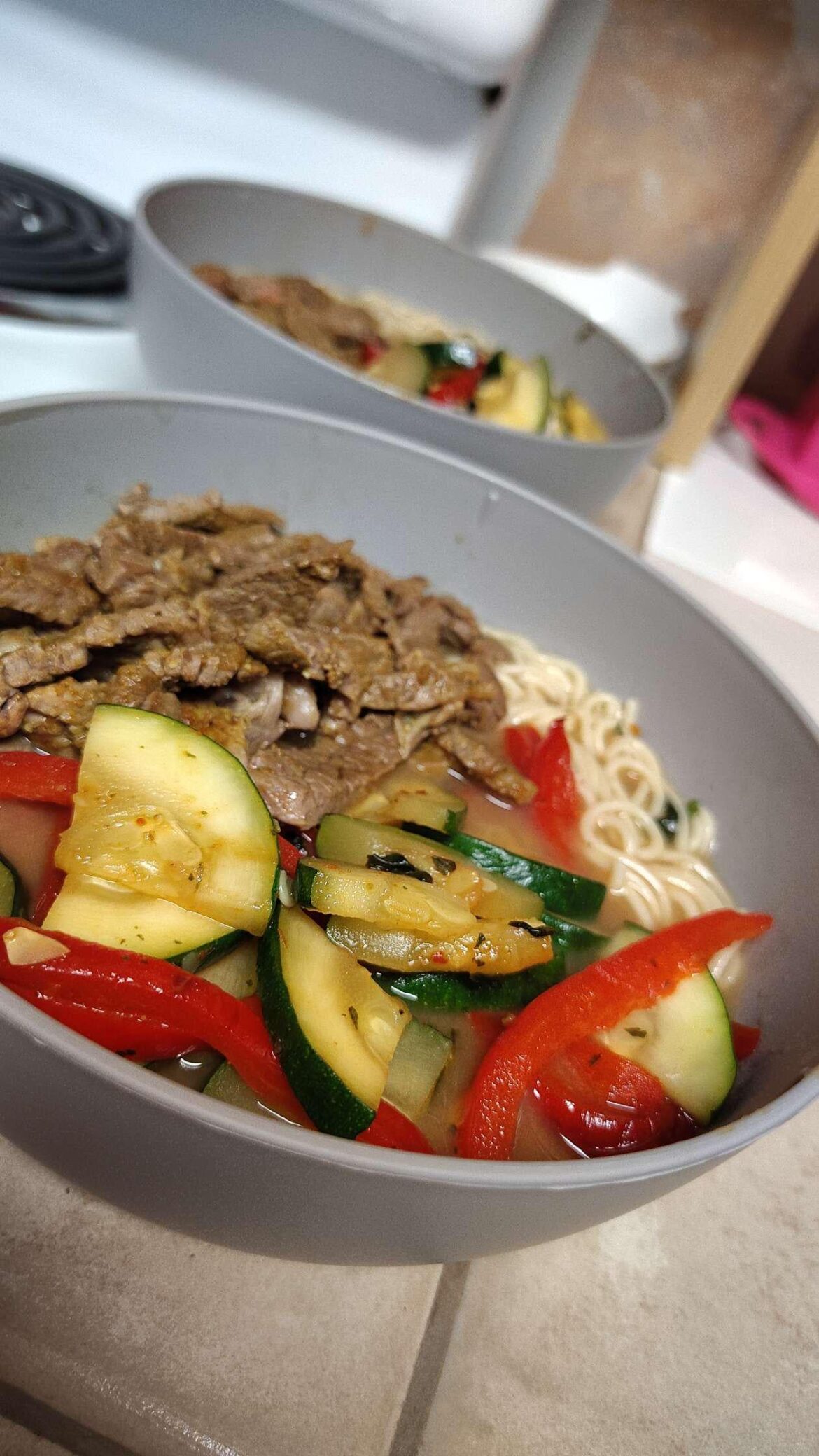 Ramen with [steak zucchini and red peppers]