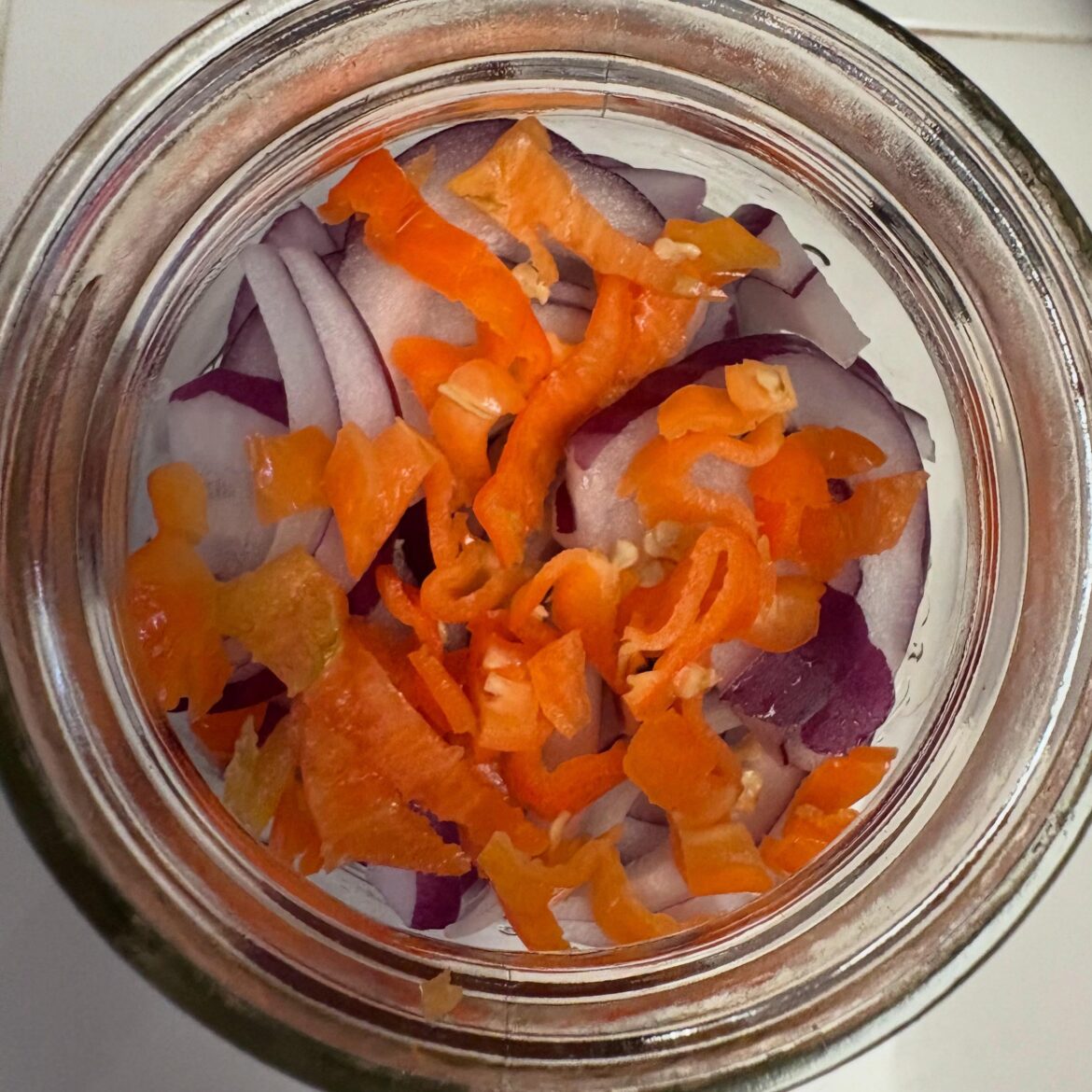 Anyone else want some red onions pickled with habanero peppers?
