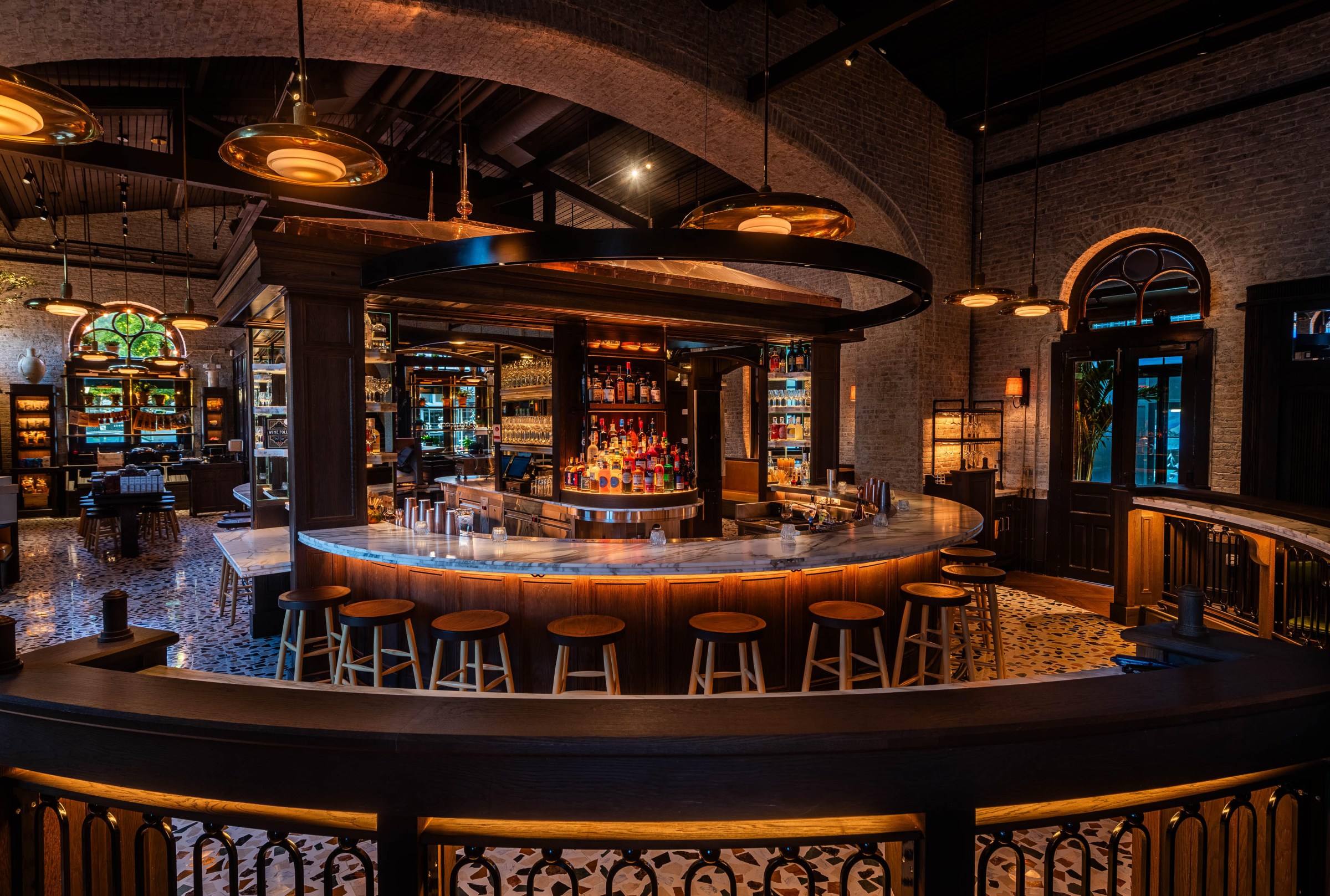 The round bar serves both Italian-influenced cocktails and an array of mozzarella dishes.