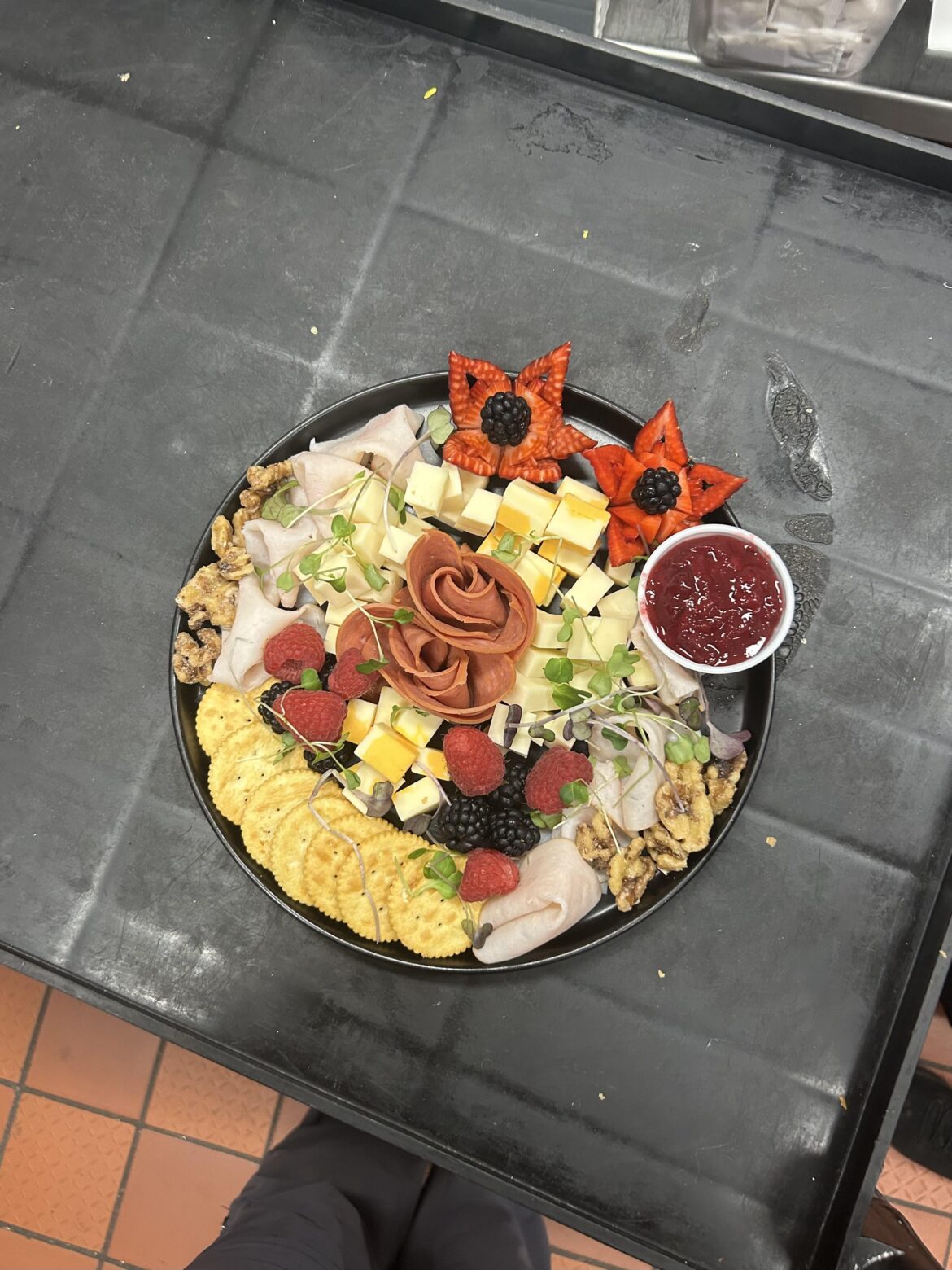 The charcuterie board we sell at the restaurant I work at