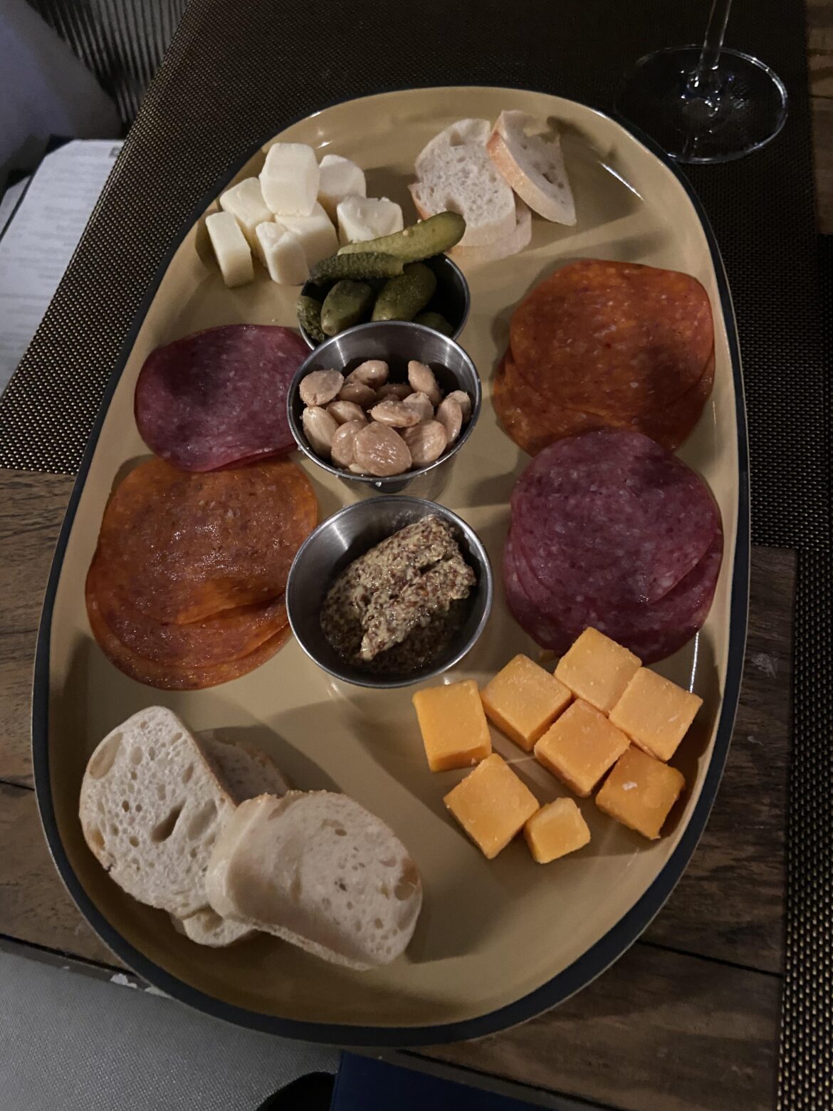My $22 “charcuterie board” at a rooftop bar near Disneyland